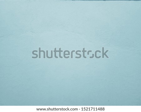 Smooth surface blue cement wall background in vintage style for graphic design or wallpaper