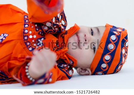 Traditional dressing of a 1 year old girl