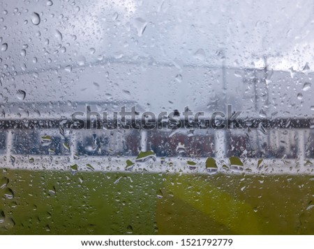 Glass picture in the rain and Background
