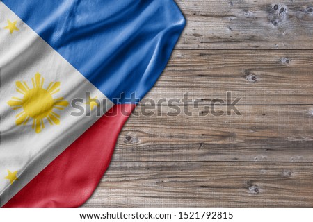 Wooden pattern old nature table board with Philippines flag
