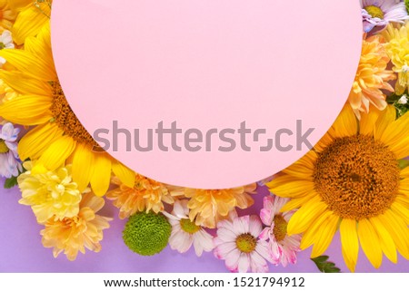 Beautiful composition with flowers and blank card on color background