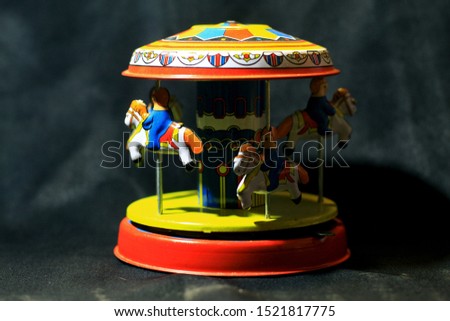 vintage carousel horses and light