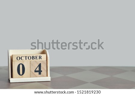 Empty Background with number cube on the table, October 4.