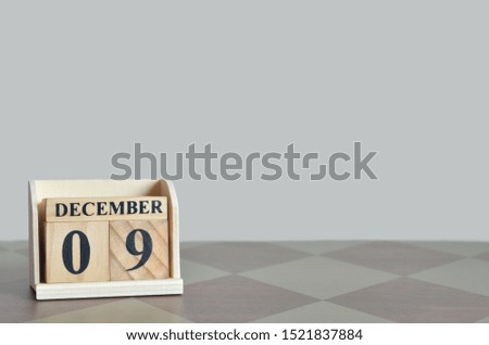 Empty Background with number cube on the table, December 9.
