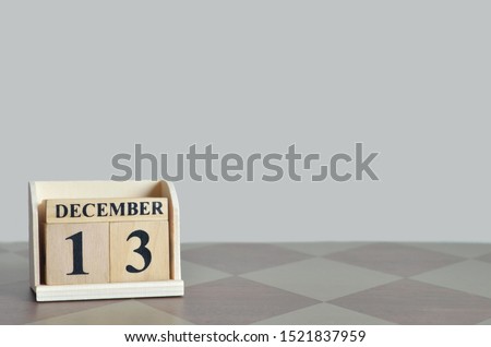 Empty Background with number cube on the table, December 13.