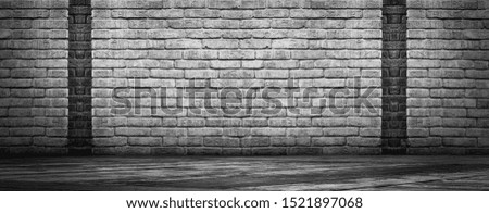 empty room with a brick wall, gray background. Studio room.