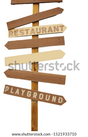 Wooden plank directional road sign with empty pointing arrows and restaurant and playground writings