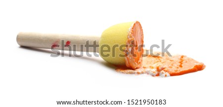 Color dabbing, stamp sponge with orange paint isolated on white background