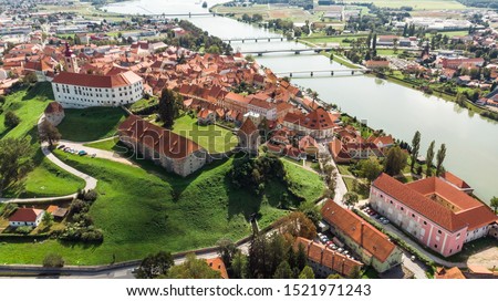 Ptuj Grad in Slovenia, Historic Old Town and Castle. Aerial Drone View.