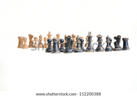 Chess game without board, lateral view of isolated pieces on white 