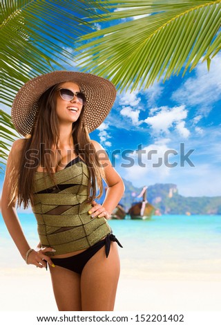Young woman on the beach in Phi Phi island in Thailand
