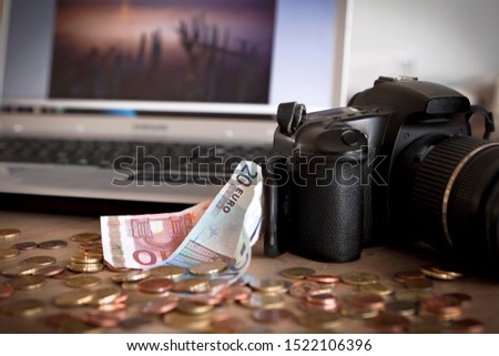 Money, camera, computer, earning money through selling photos