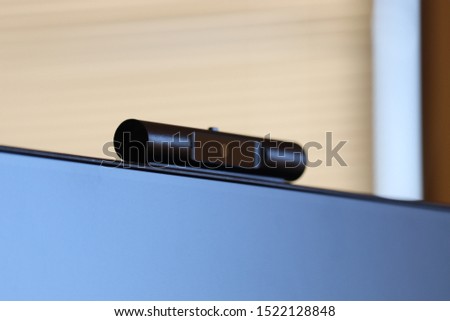 Webcam above computer screen. Black webcam above black screen Royalty-Free Stock Photo #1522128848