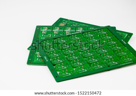 Multiplied printed circuit boards PCB isolated on the white background. PCB assembly.
