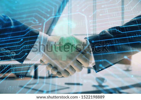 Double exposure of business theme drawing on office background with two businessmen handshake. Concept business