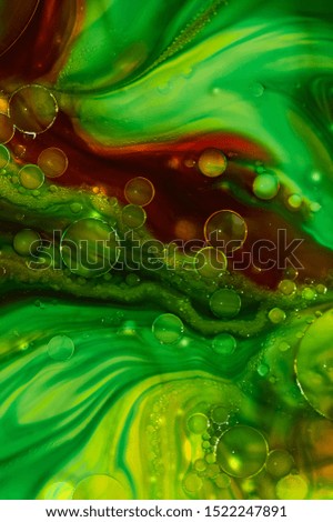 The green dyes in water and oil