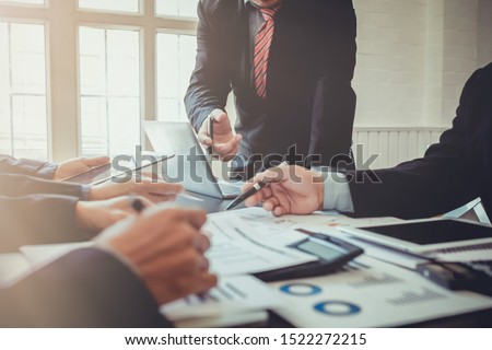 Soft Light ,The business group is advising and advising on investment and business expansion after meeting the results of the previous year which is satisfactory and wanting to invest more in business Royalty-Free Stock Photo #1522272215