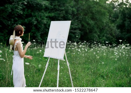 beautiful woman outdoors young artist easel