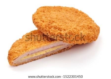 Fried Chicken schnitzel cordon bleu with cheese in breadcrumbs, restaurant food, isolated on white background.