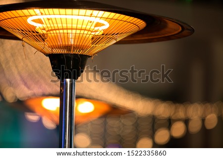 A Electric heater  for winter season . heater for Events and like marriges and party and clubs Royalty-Free Stock Photo #1522335860