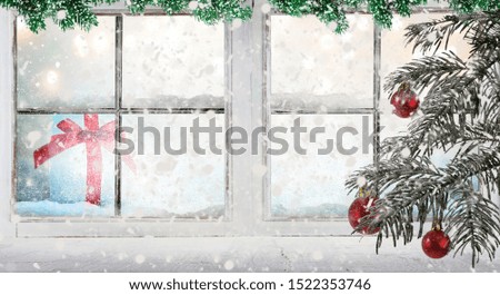 Christmas window, with pine branches, gift and snow in winter mood 