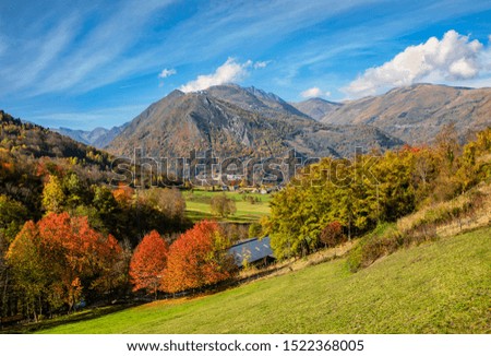 Beautiful autumn landscape in Pyrenees Mountains featuring in the distance The Arbizon Massif