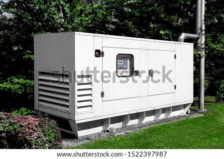 emergency generator for uninterruptible power supply, diesel installation in an iron casing with an electric switchboard power management. Royalty-Free Stock Photo #1522397987