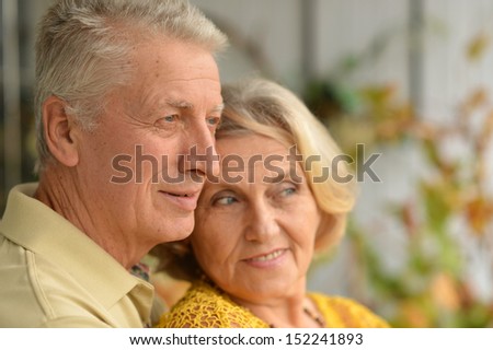Portrait of a beautiful caucasian elderly couple relaxing at home