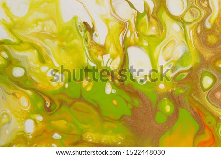 Bright fall colors comingle in this abstract background featuring neon yellow, bright green, glittering gold, vibrant orange, and white which form abstract autumn flames.