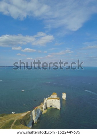 Old Harry Rocks are three chalk formations, including a stack and a stump, located at Handfast Point, on the Isle of Purbeck in Dorset, southern England. UNESCO World Heritage Site