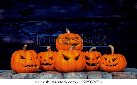 pumpkin background Halloween. Happy spooky scary pumpkin heads. October Halloween design with copy space