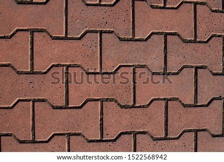 Paving stones. Covering of sidewalks. Royalty-Free Stock Photo #1522568942