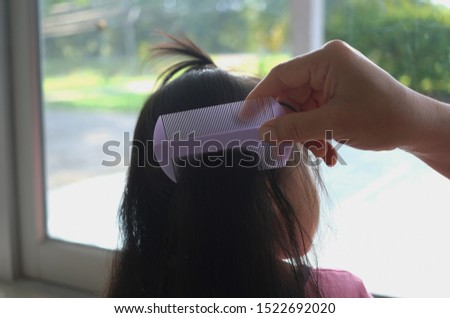 Comb hair to find lice on the child's head.