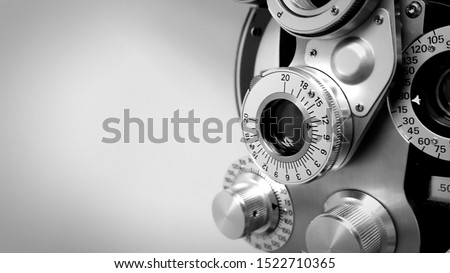 Close up vintage side view of phoropter for refraction Royalty-Free Stock Photo #1522710365