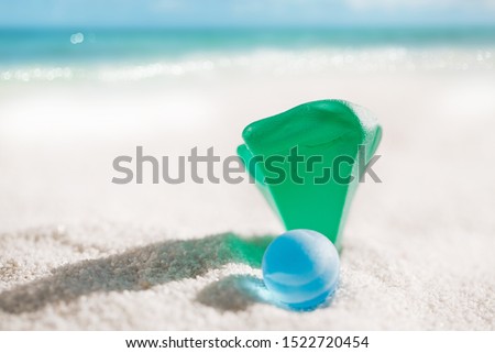 sea glass and marble  with white sand beach  seascape