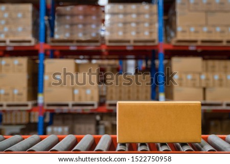 Shipping box Brown Packed courier on production line against cardboard boxes in warehouse Deliver Conveyor belt