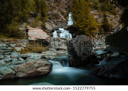 Lillaz waterfall in the early morning | Cogne, Valle d'Aosta, Italy Royalty-Free Stock Photo #1522779755