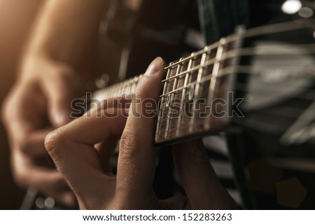 guitarist plays Royalty-Free Stock Photo #152283263