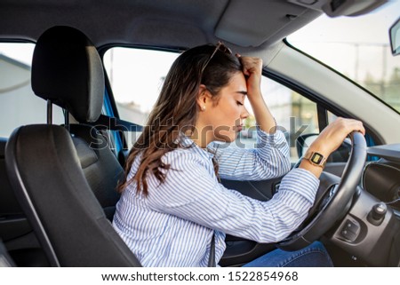 Stressed woman drive car feeling sad and angry. Asian girl tired, fatigue mental on car. Sleepy and drunk female hangover. Illegal law driver license. Driving when tired and don’t drive drowsy concept Royalty-Free Stock Photo #1522854968