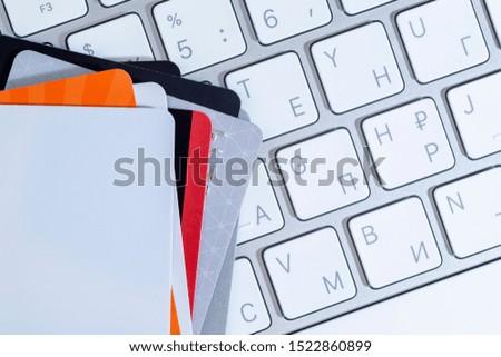 credit cards on the background of a computer keyboard business