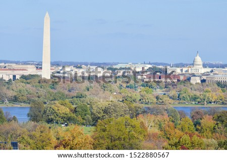 Washington DC skyline with Washington Monument, United States Capitol building, and Potomac River in Autumn foliage