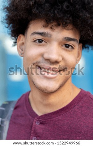 African teen student in the university with afro hair