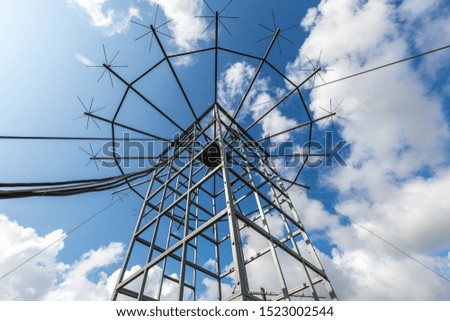 Antennas of military radio station are on the roof and blue sky as a background.