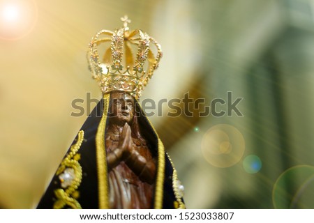 Statue of the image of Our Lady of Aparecida, mother of God in the Catholic religion, patroness of Brazil Royalty-Free Stock Photo #1523033807
