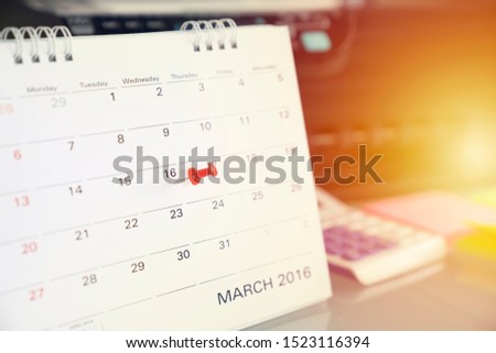 close up of calendar on the table, planning for business meeting or travel planning concept