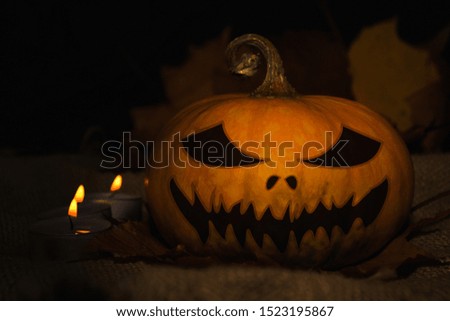 Halloween. ominous pumpkin in the dark, background.