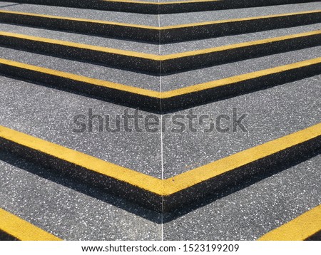 yellow road sign on asphalt