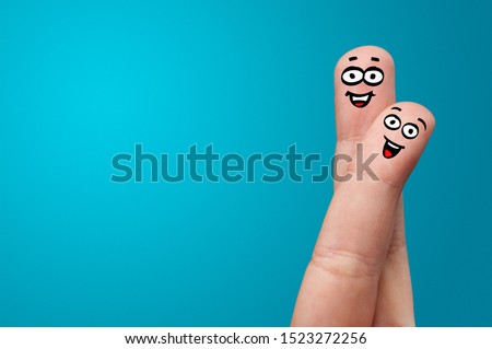 Happy face fingers hug each other
