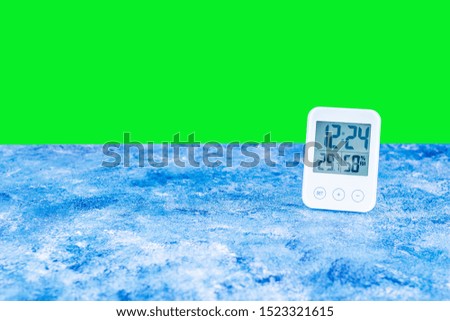 Indoor electronic LCD digital clock with humidity temperature sensor display device with green background
