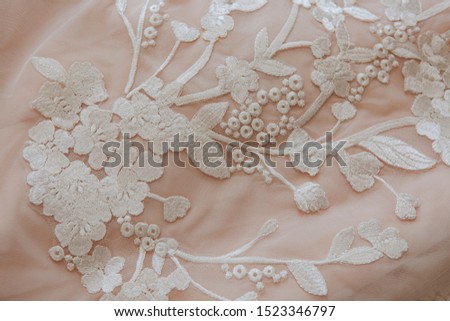 bride wedding dress with lace closeup texture and patterns